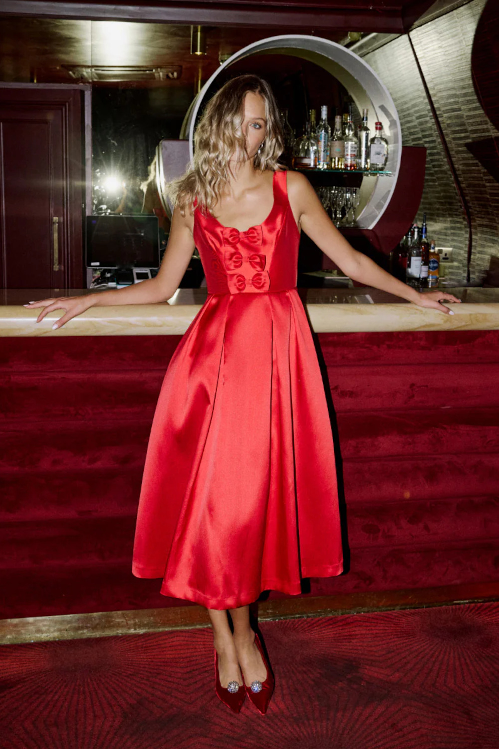 Woman in red party dress