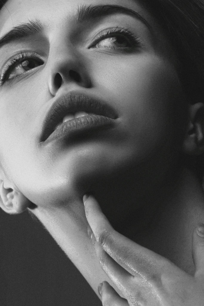 Black and white image of a woman's face | aesthetic treatment trends 2025