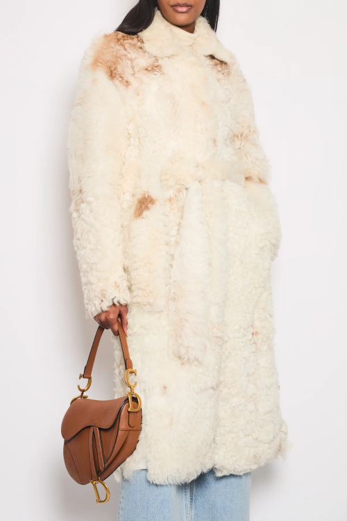 Woman in fluffy faux fur coat