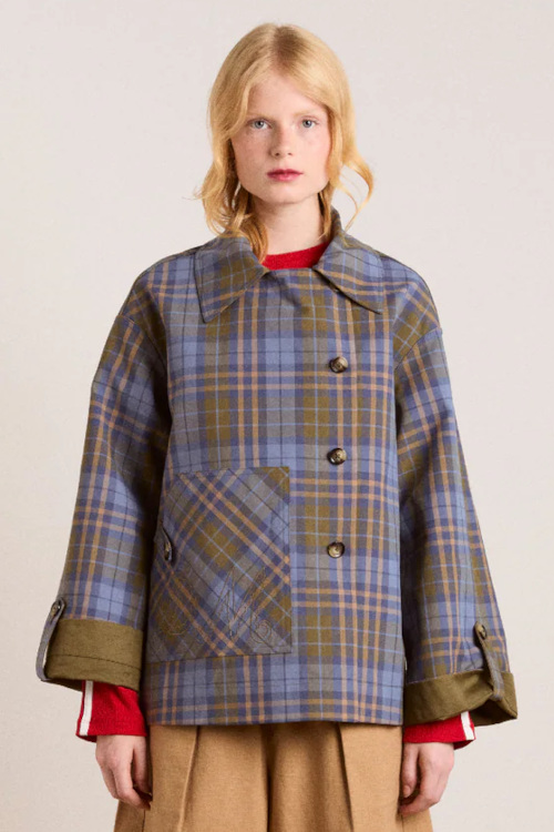 Model in check coat