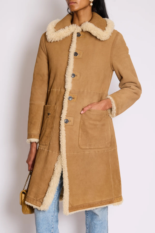 Woman in shearling coat