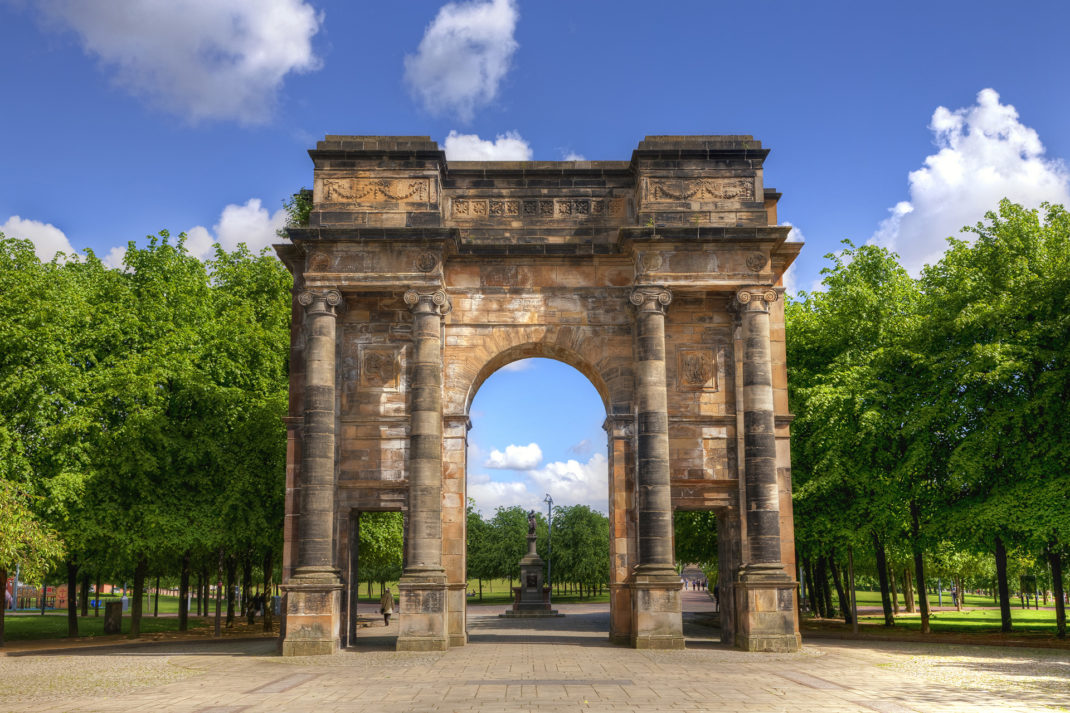 The McLennan Arch at the entrance to Glasgow Green, on a blue sky summer day