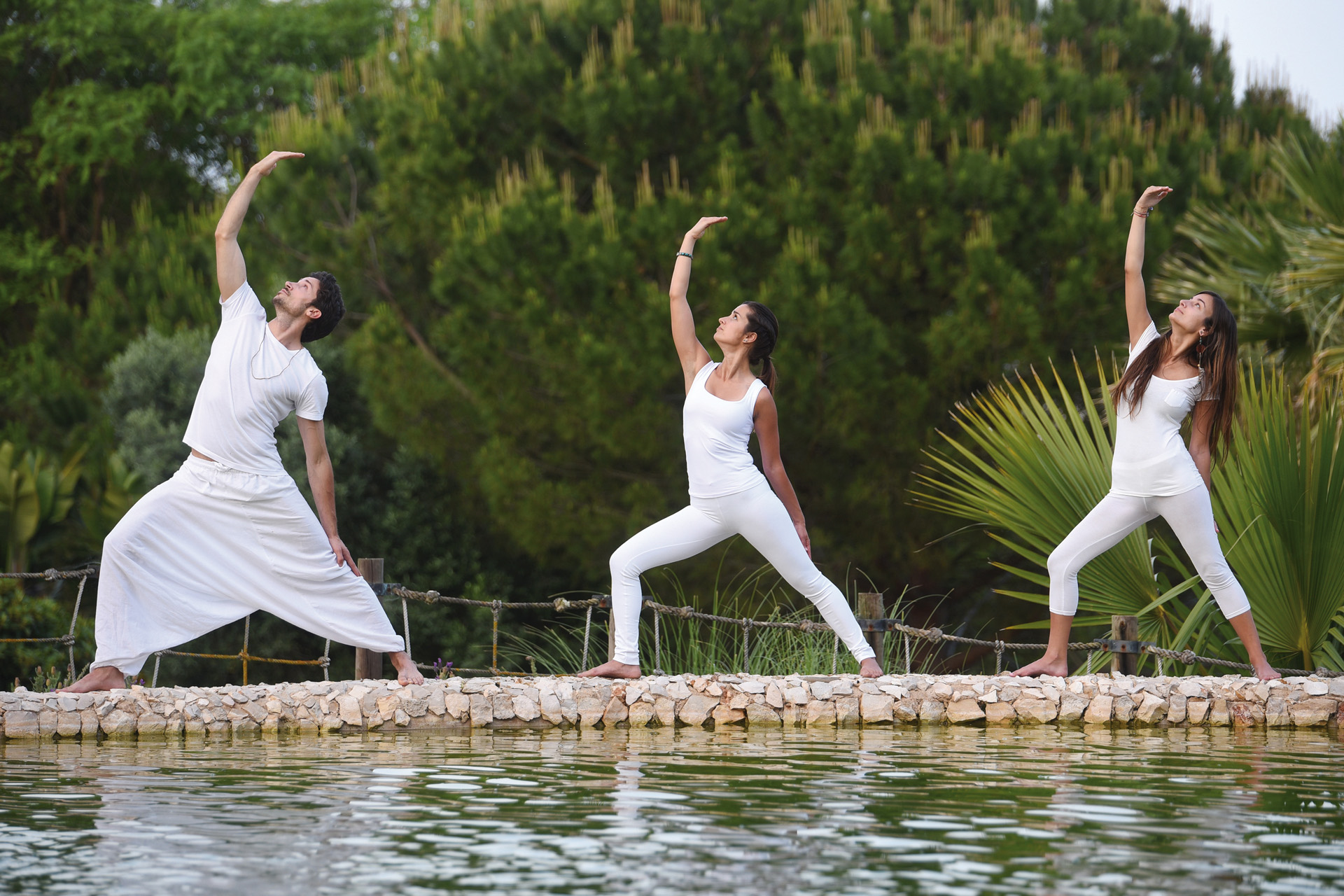 Yoga class by the pool