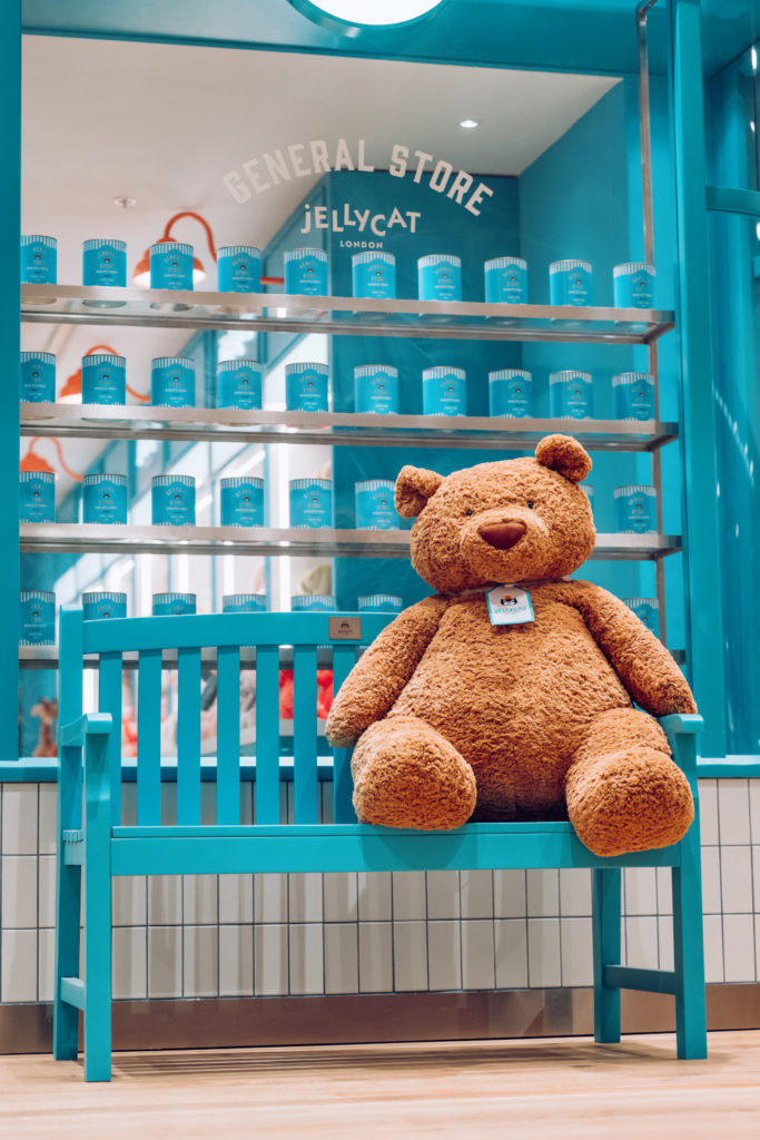 Bear on blue bench