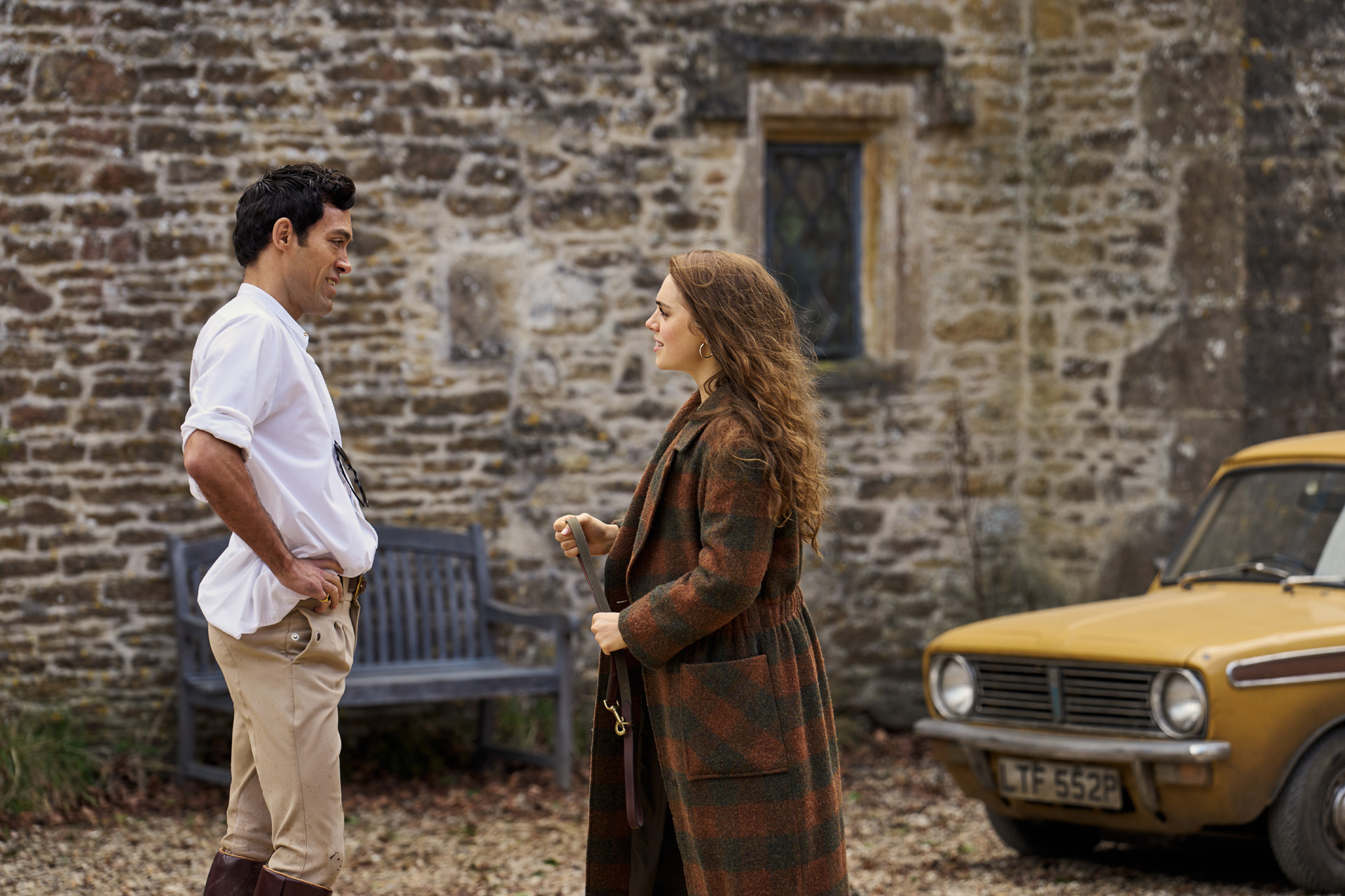 Alex Hassell as Rupert Campbell-Black & Bella Maclean as Taggie O’Hara in Rivals. 