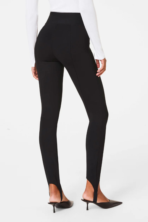 Model in black leggings
