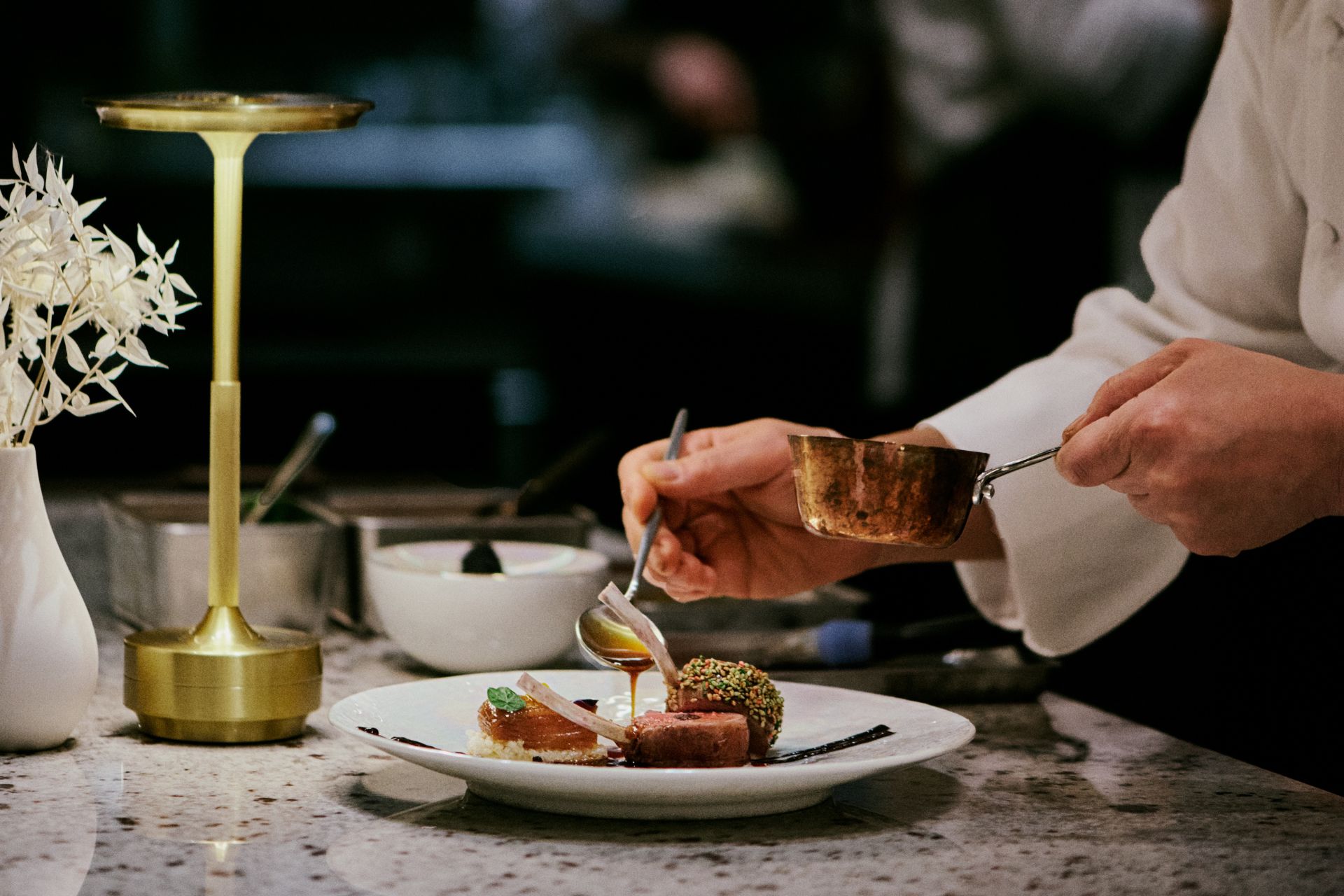 Chef preparing a Korean tasting menu