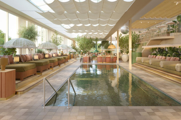 A swimming pool flanked by loungers