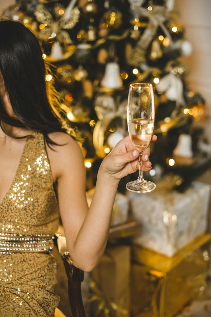 Woman holding a glass of champagne