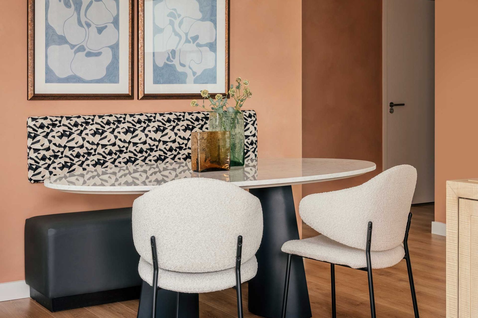 Terracotta dining room with cream boucle chairs