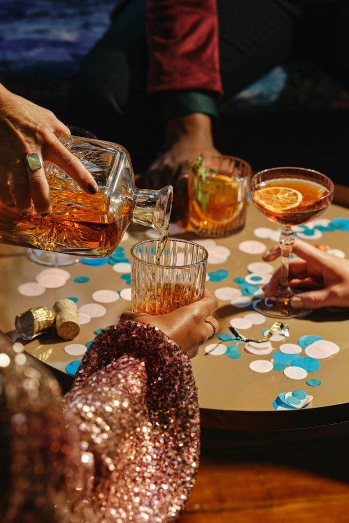 Group of friends drinking cocktails