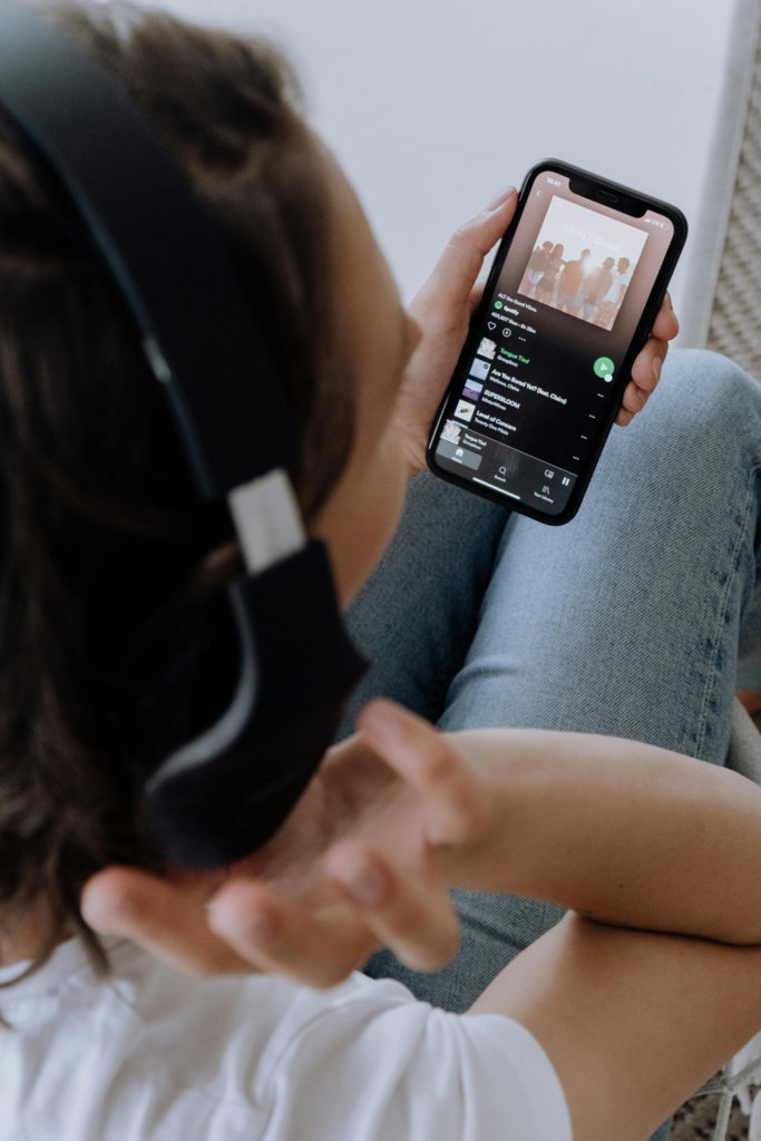 A phone with Spotify open