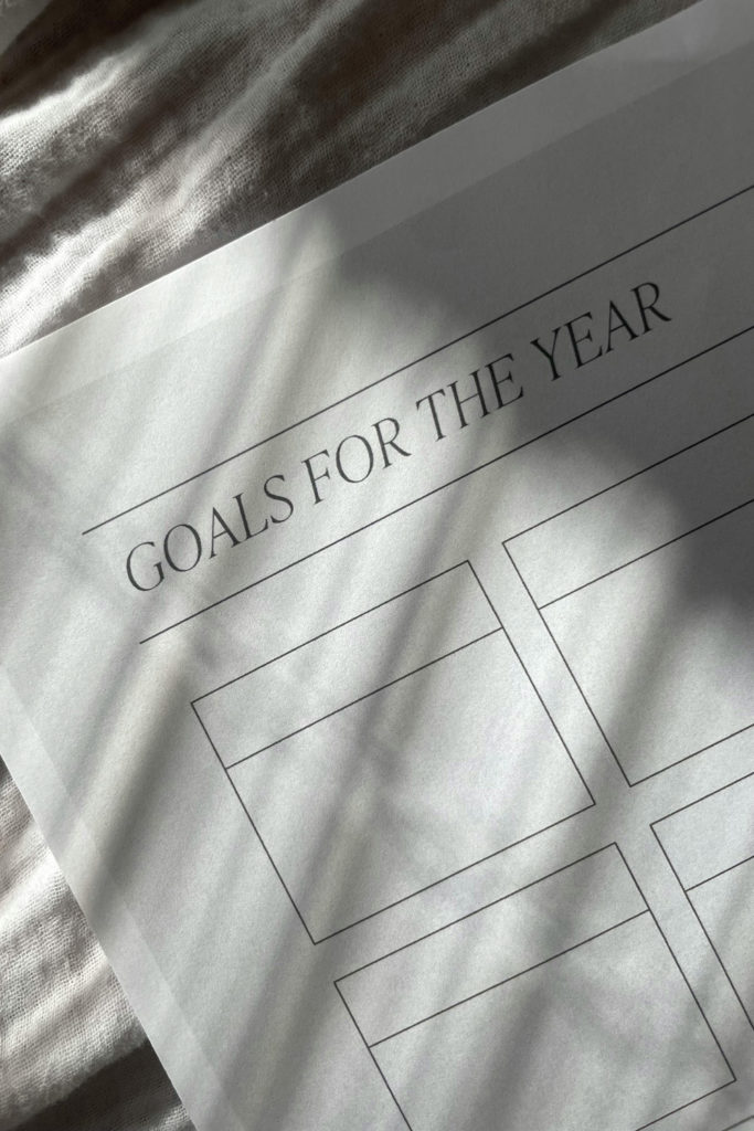 A piece of paper reading 'goals for the year'