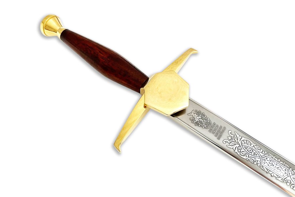 Silver ceremonial sword with wooden hilt