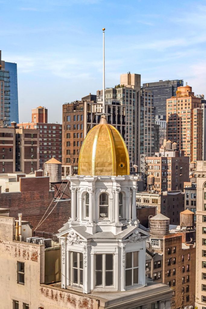 New York skyscrapers including a penthouse with a gold cupola