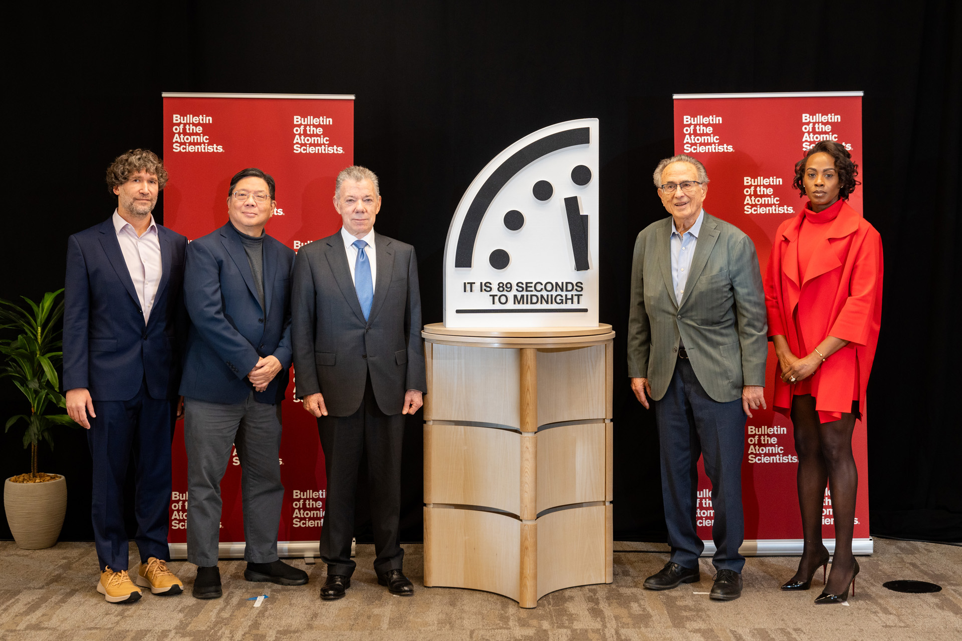 Scientists announcing the 2025 doomsday clock