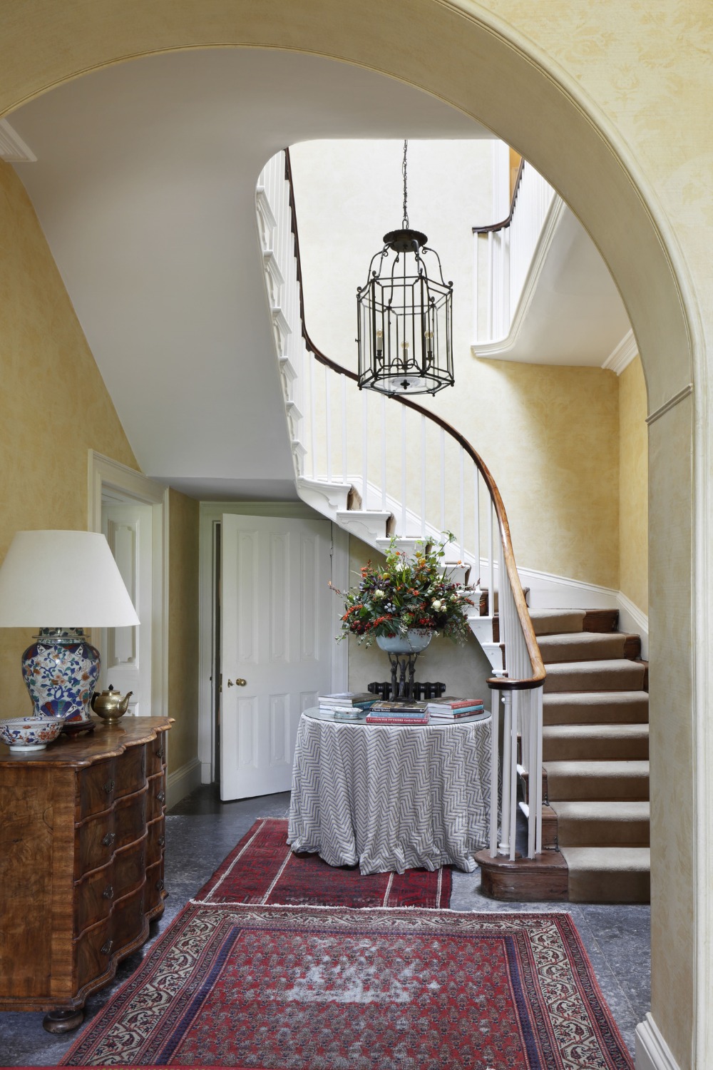 Hallway with grand staircase