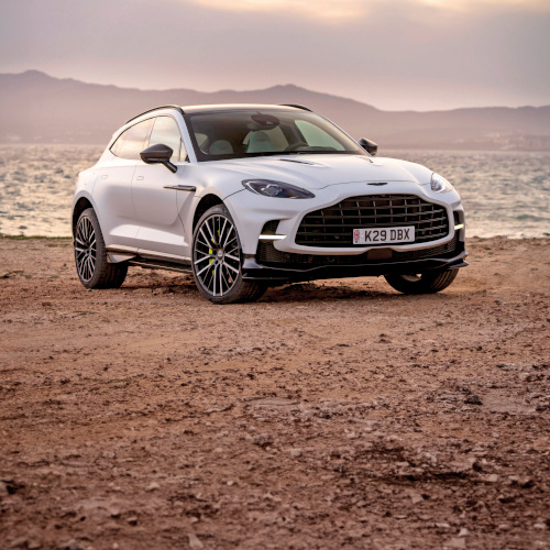 White car on dust path