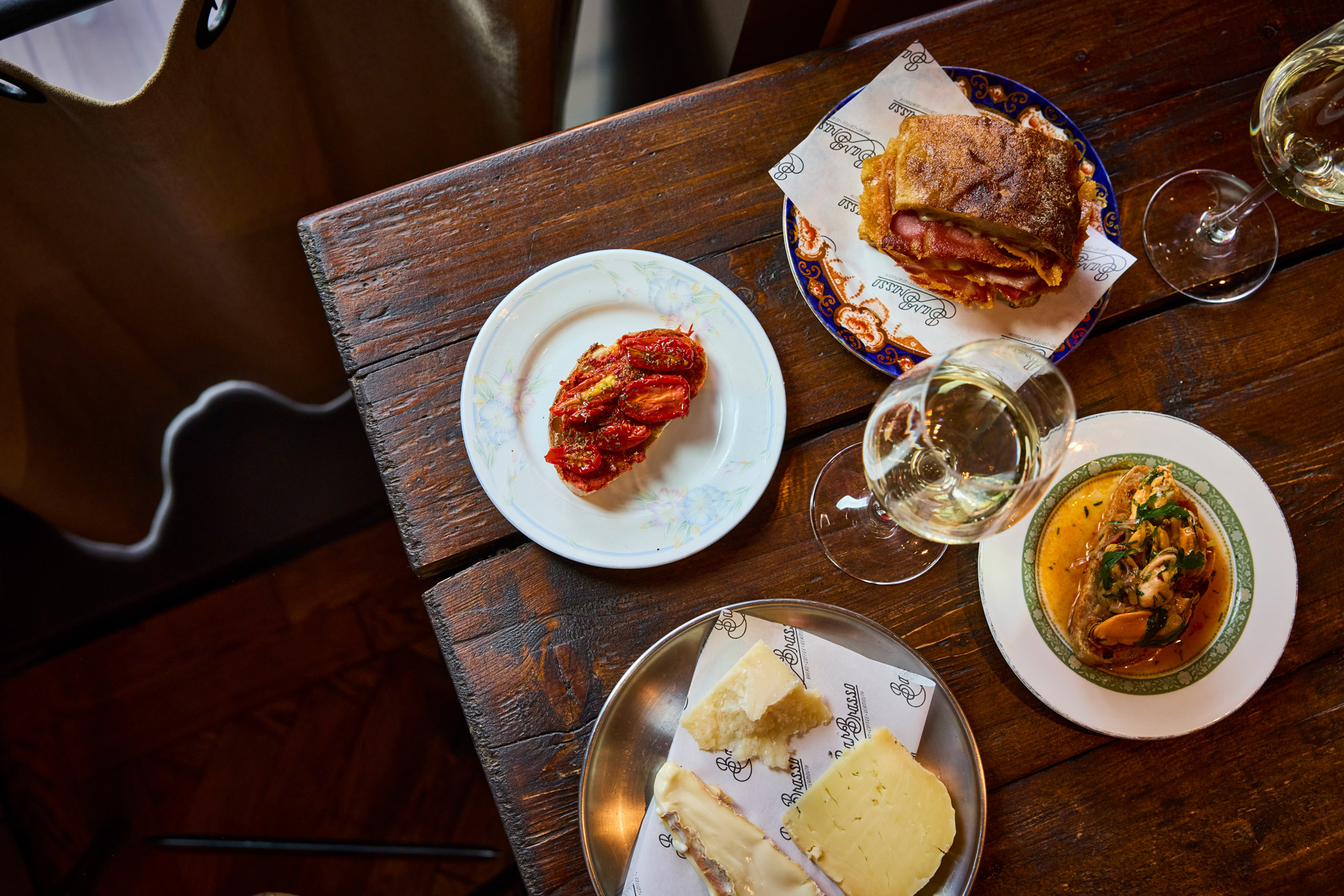 Food and glass of wine at Bar Brasso