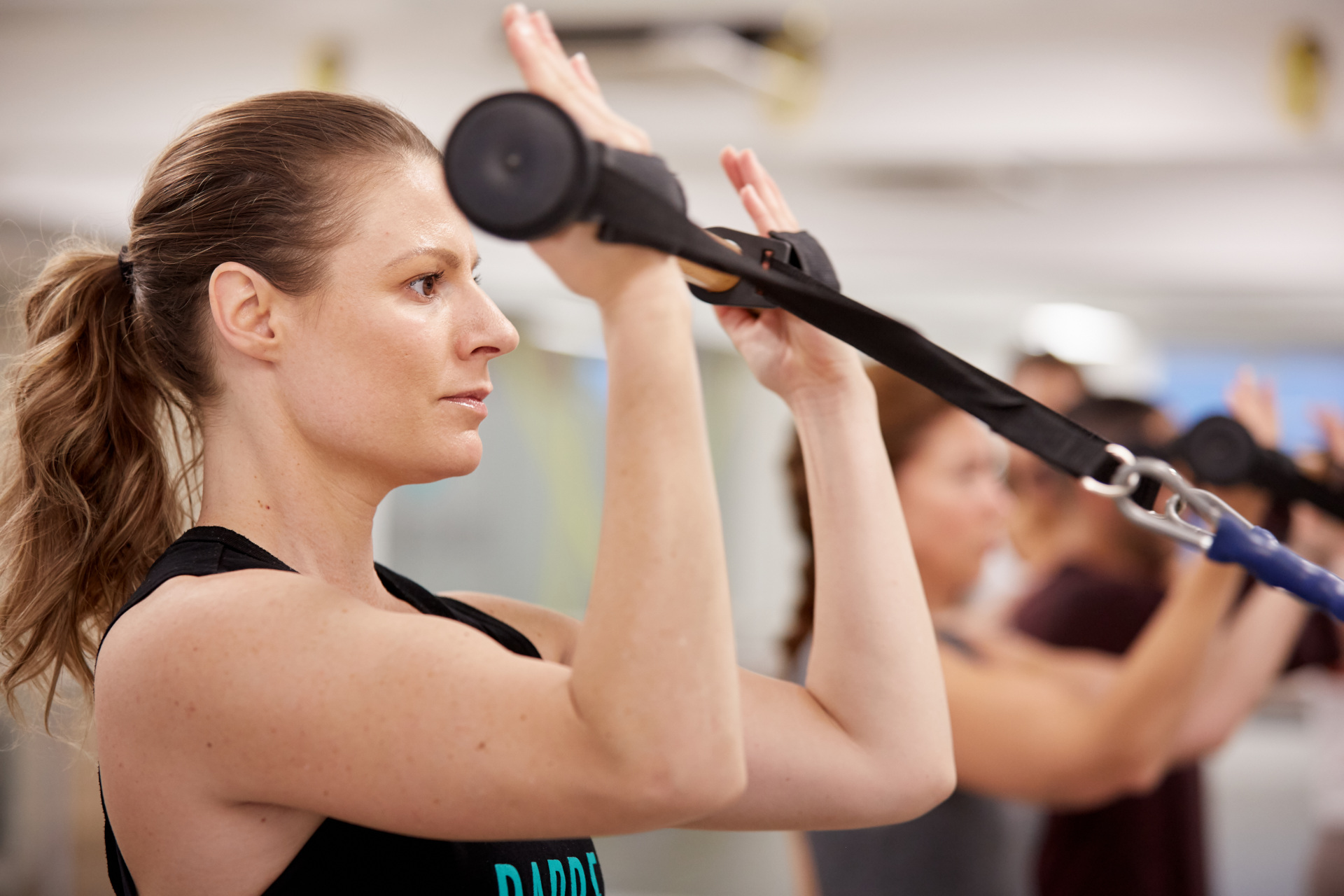People doing vertical reformer pilates