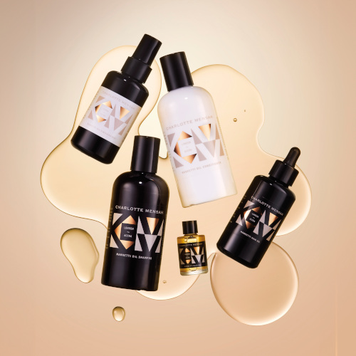 Bottles in serum on bronze background