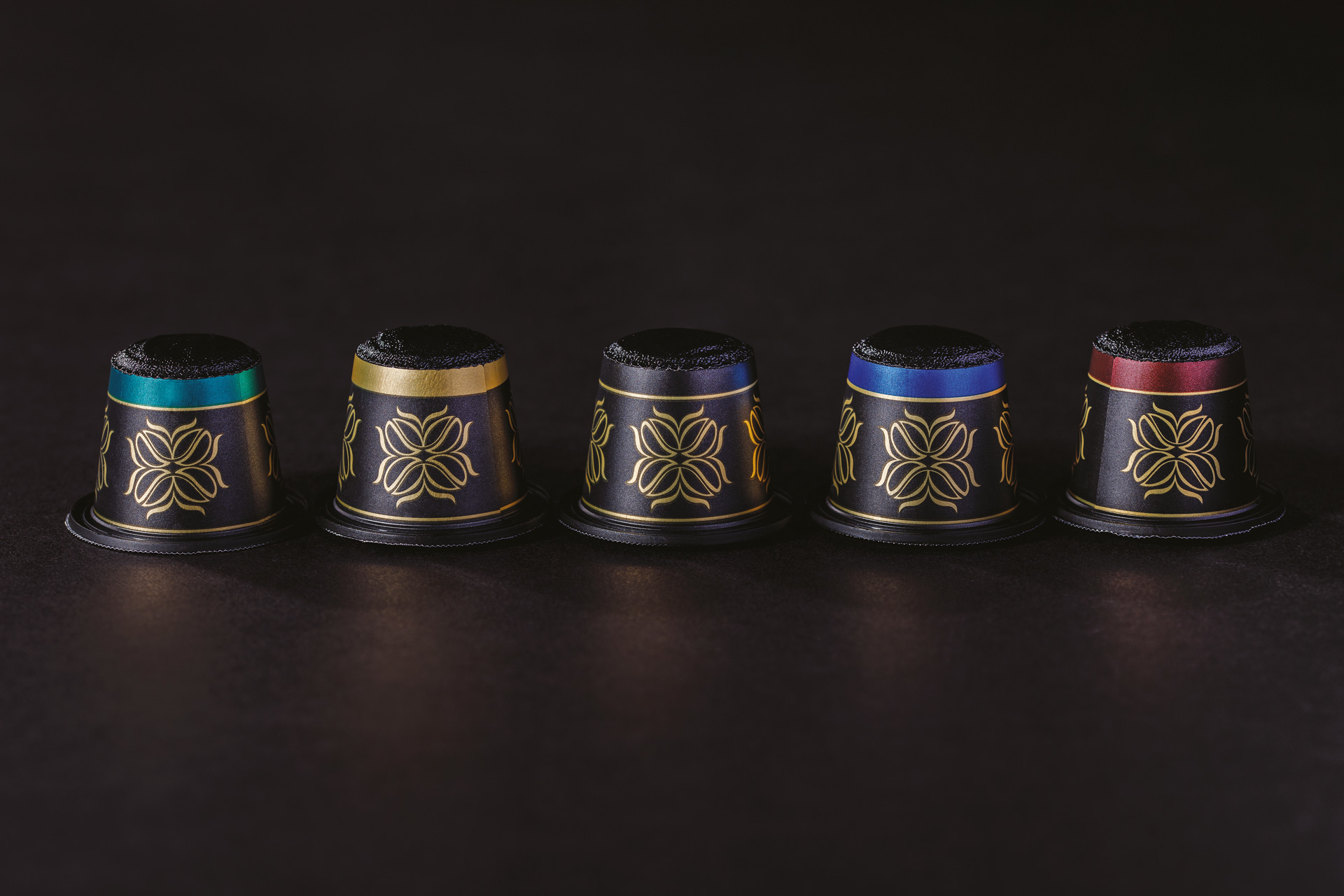 A line of coffee pods