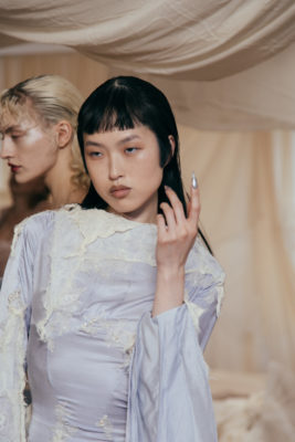 Model with baby bangs