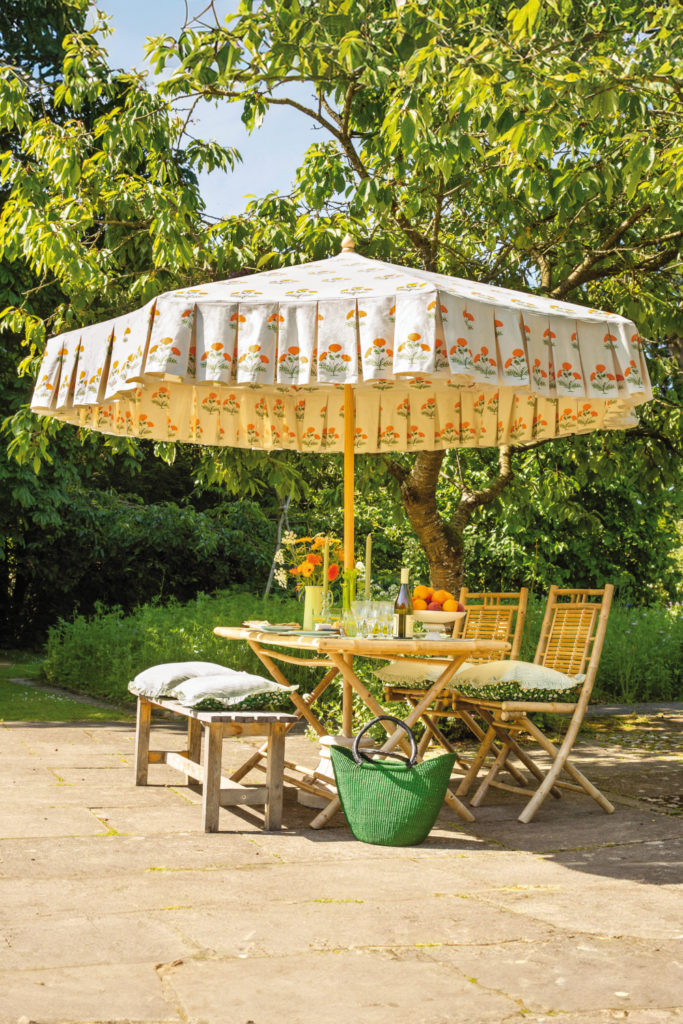 East London Parasol Company parasol with table and chairs