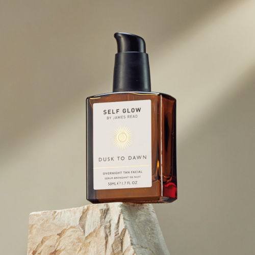 Bottle balanced on stone | independent british beauty brands