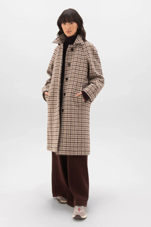 Woman in herringbone coat