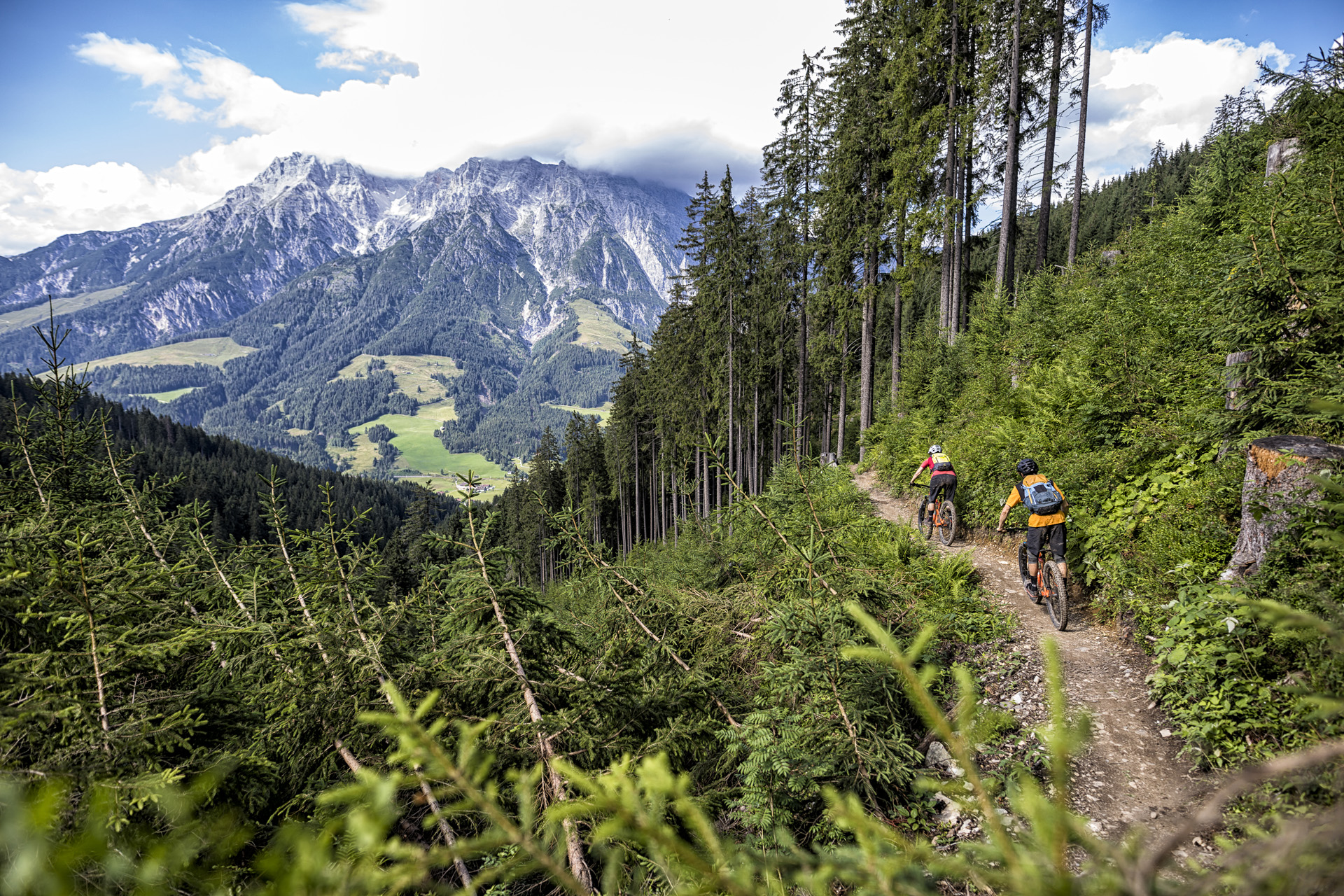 Two people mountain biking in Austria