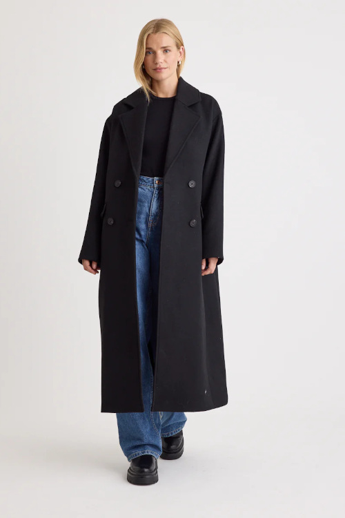 Woman in black coat