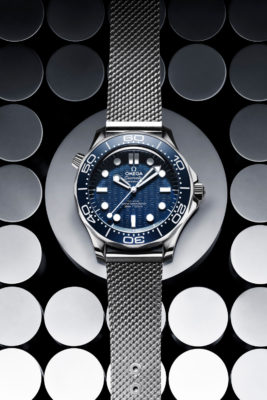 Silver watch on circular background