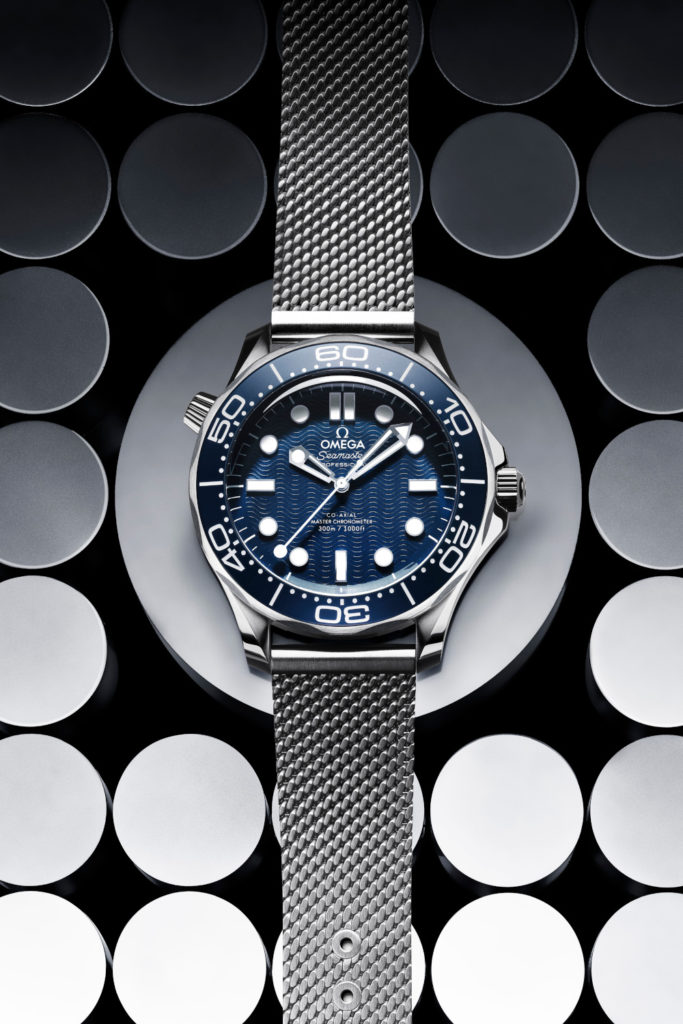 Silver watch on circular background