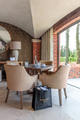 Chairs and a table at The Marquis Spa