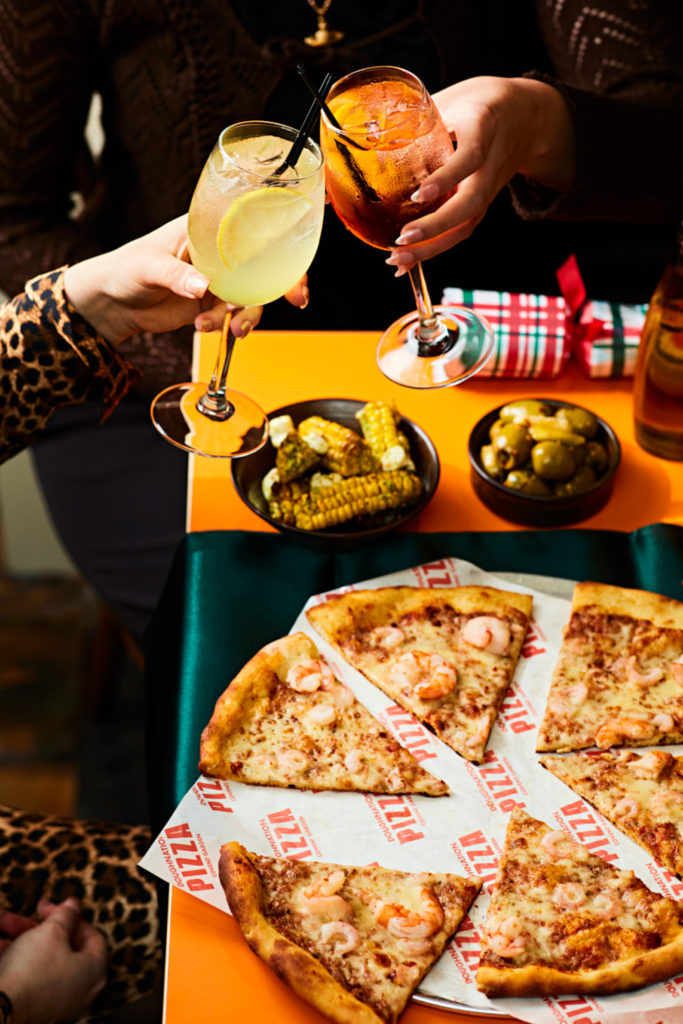 Pizza and spritz drinks