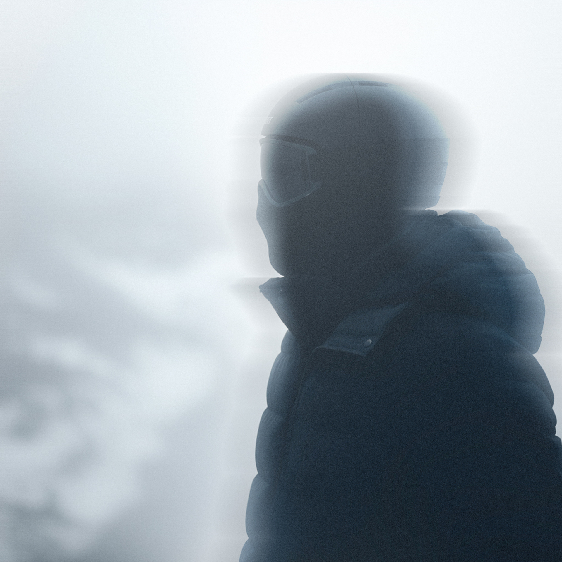 Blurry photo of someone in snowy landscape