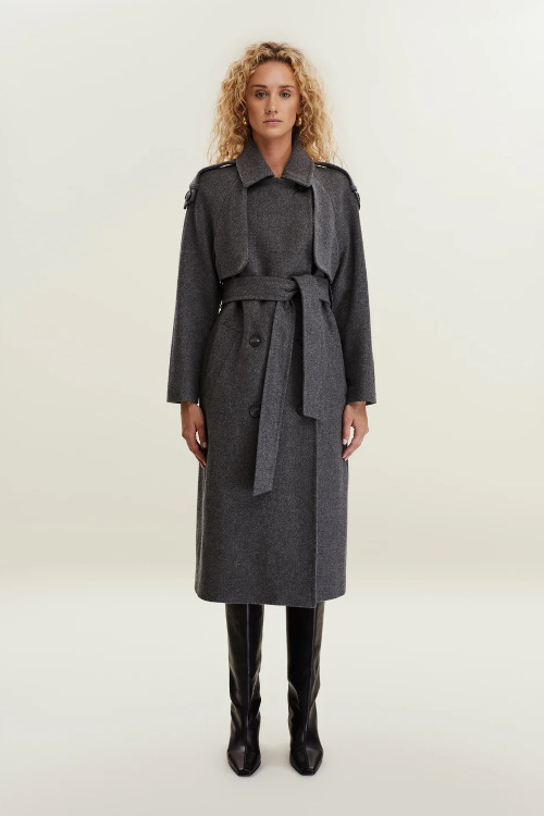 Woman in grey coat