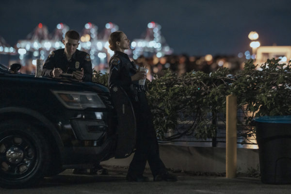 Troian Bellisario (Traci Harmon) & Brandon Larracuente (Alex Diaz) in On Call