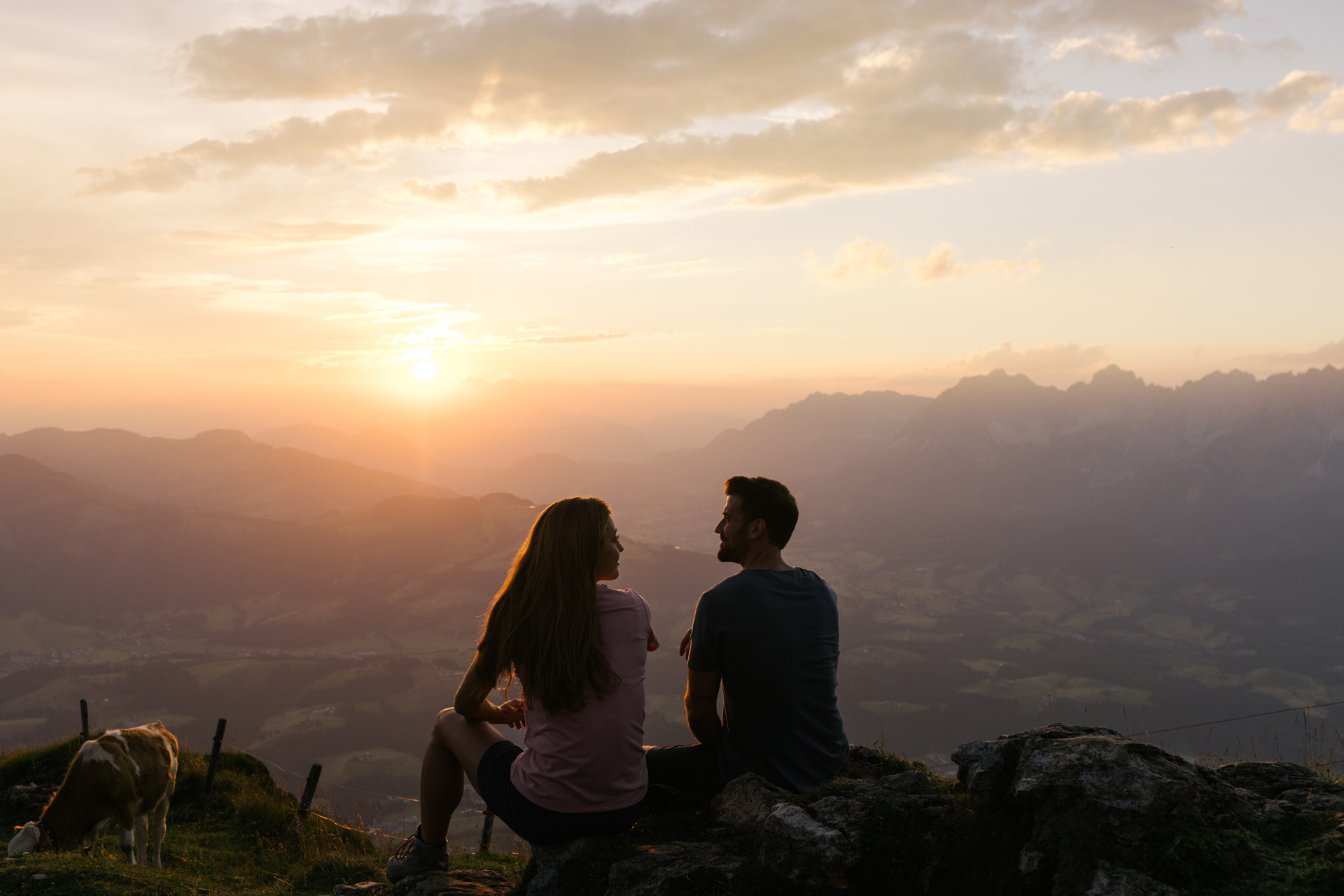 A couple on a walk at dusk