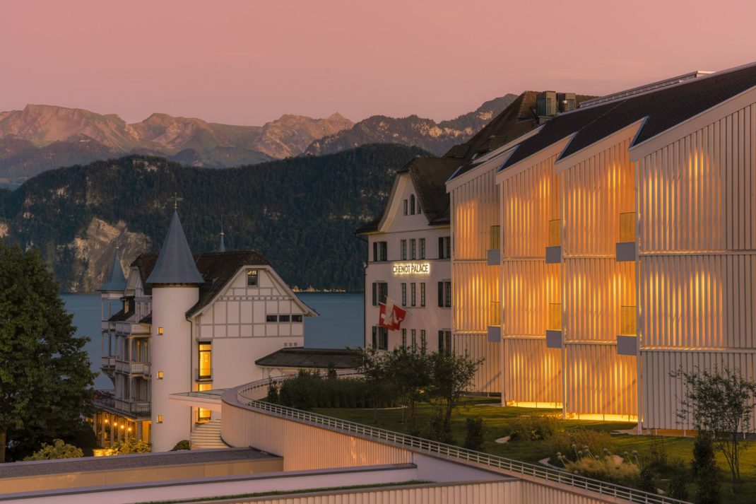 Chenot Palace Weggis exterior at dusk