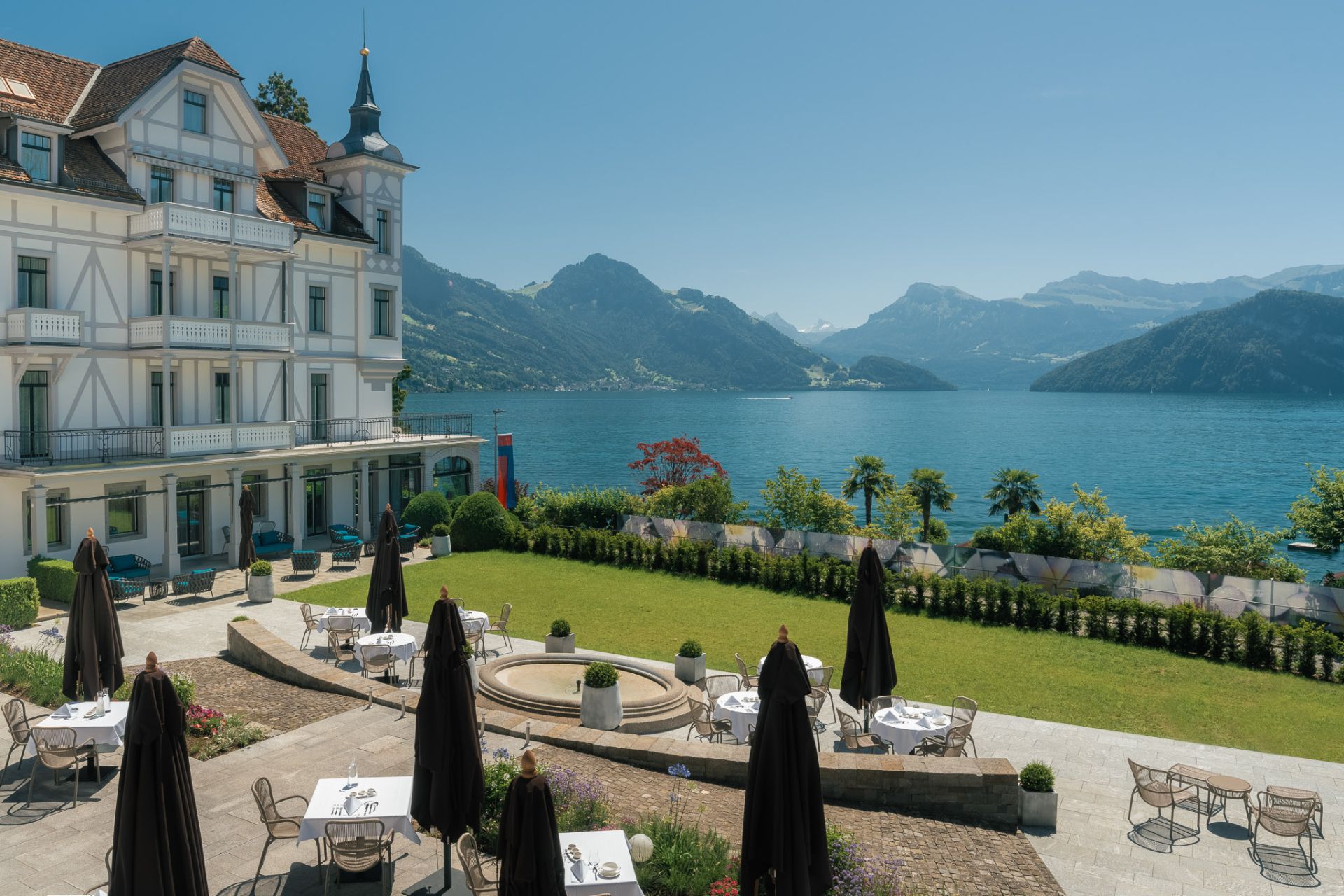 Aeial view of Chenot Palace Weggis, with views of the lake and mountains.