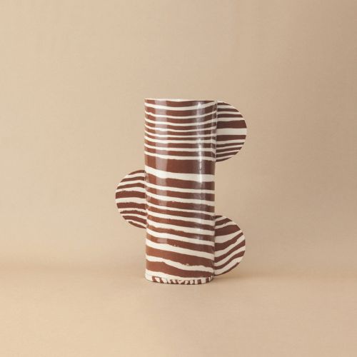 Brown and white stripe vase with semicircular sections