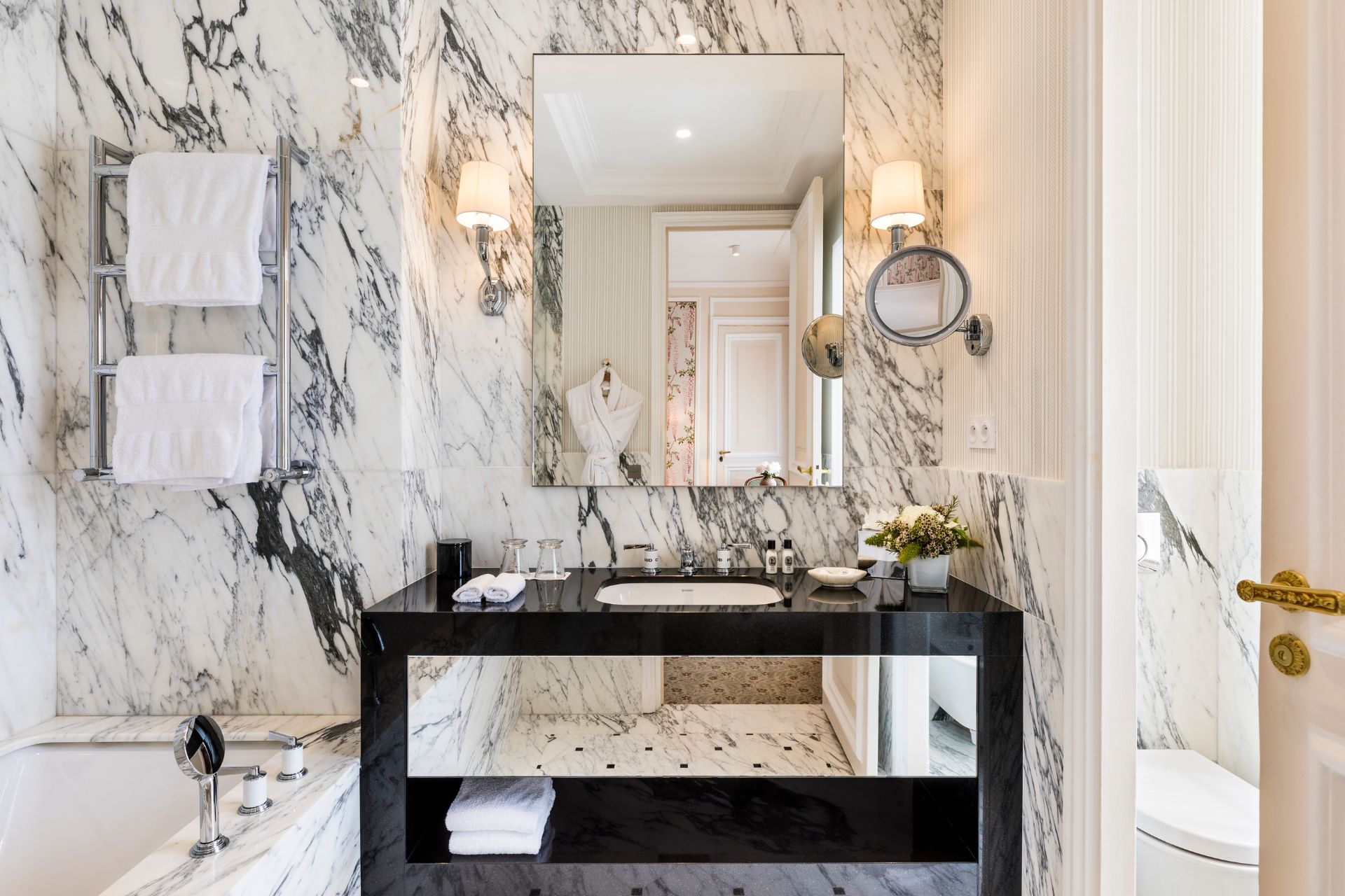 Marble hotel bathroom with Diptyque toiletries