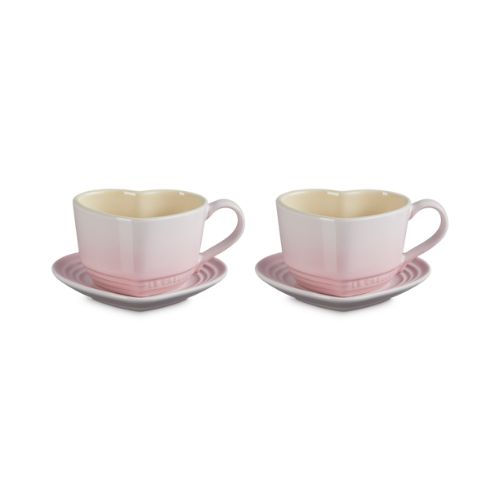 Pale pink heart shaped mugs with matching saucers