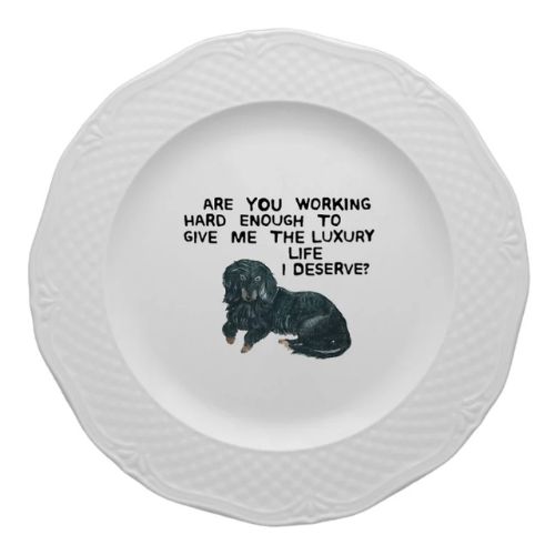 White plate with dog illustration and the words 'Are you working hard enough to give me the luxury life I deserve?'