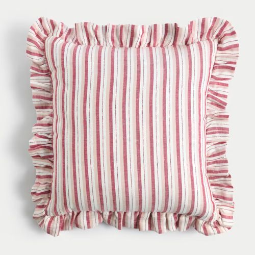 Pink and white ruffled cushion
