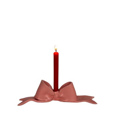 Red candlestick with pink bow design