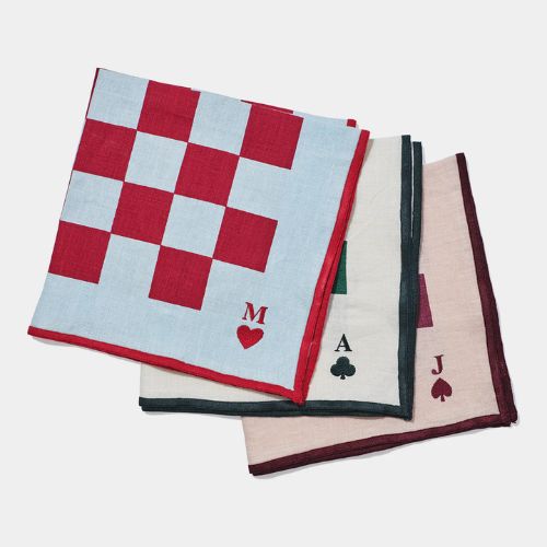 Blue, white and pale pink napkins with chess board embroidery pattern