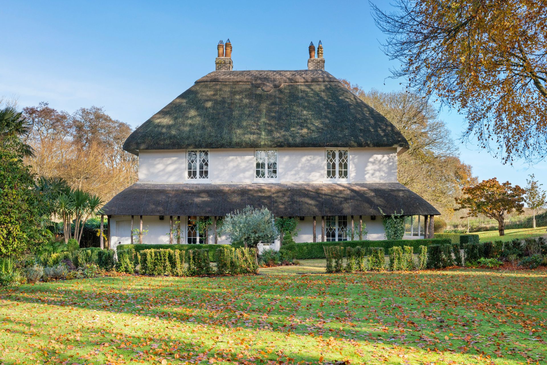 Thatched cottage with lawn